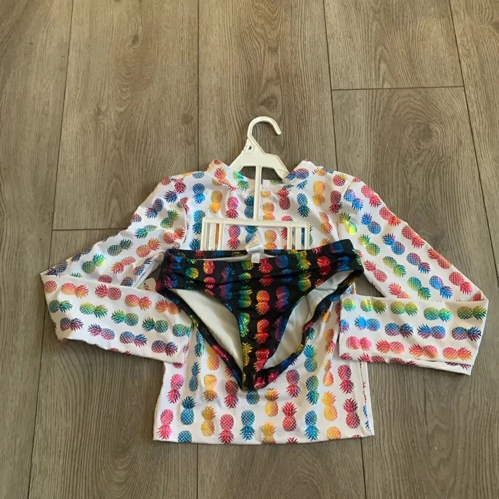 Penelope Mac girls 2 pc bathing suit with pineapple graphic design